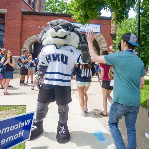 Gnarlz the UNH Athletics mascot at student event